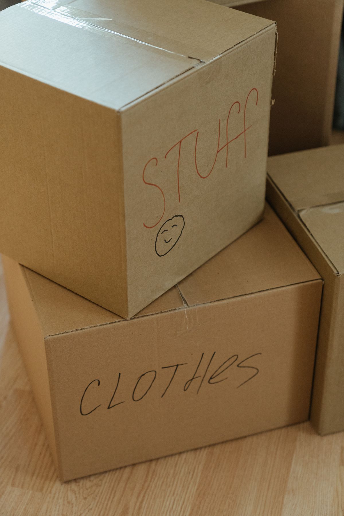 Carefully packed and labeled boxes, set aside for family and donation